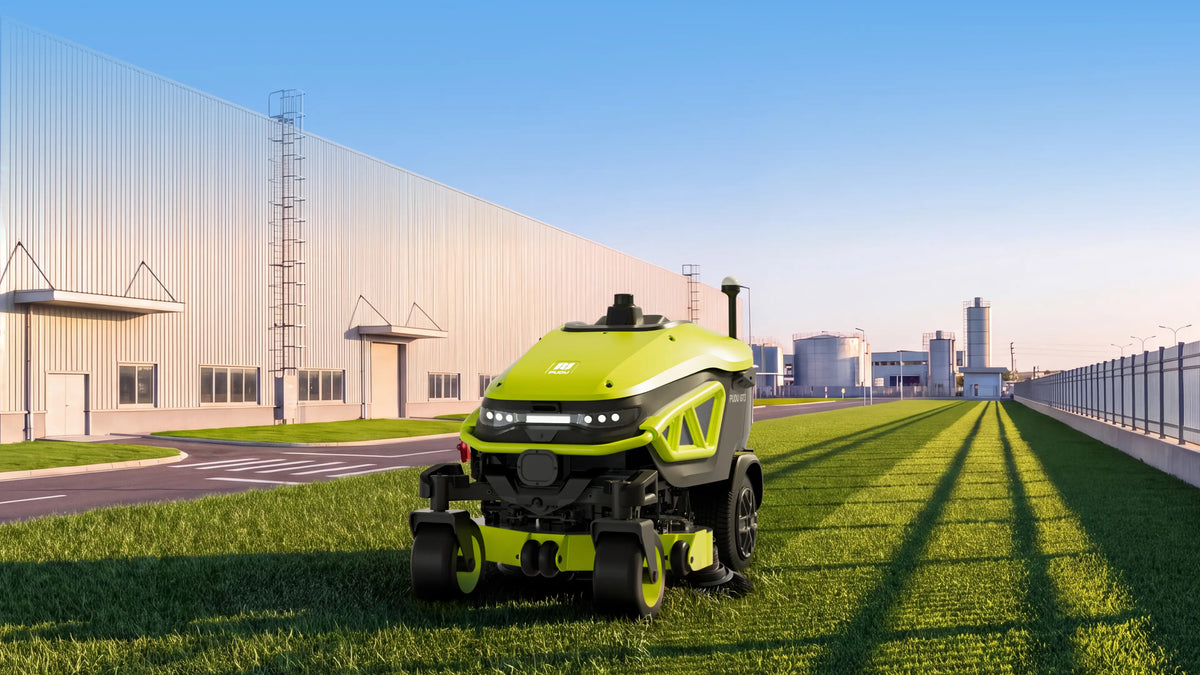 PUDU GT3 robotic mower working on outdoor turf