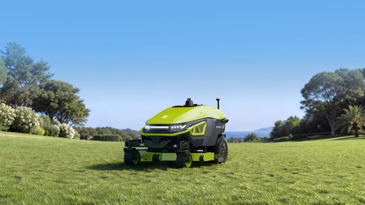 PUDU GT5 robotic mower working on outdoor turf