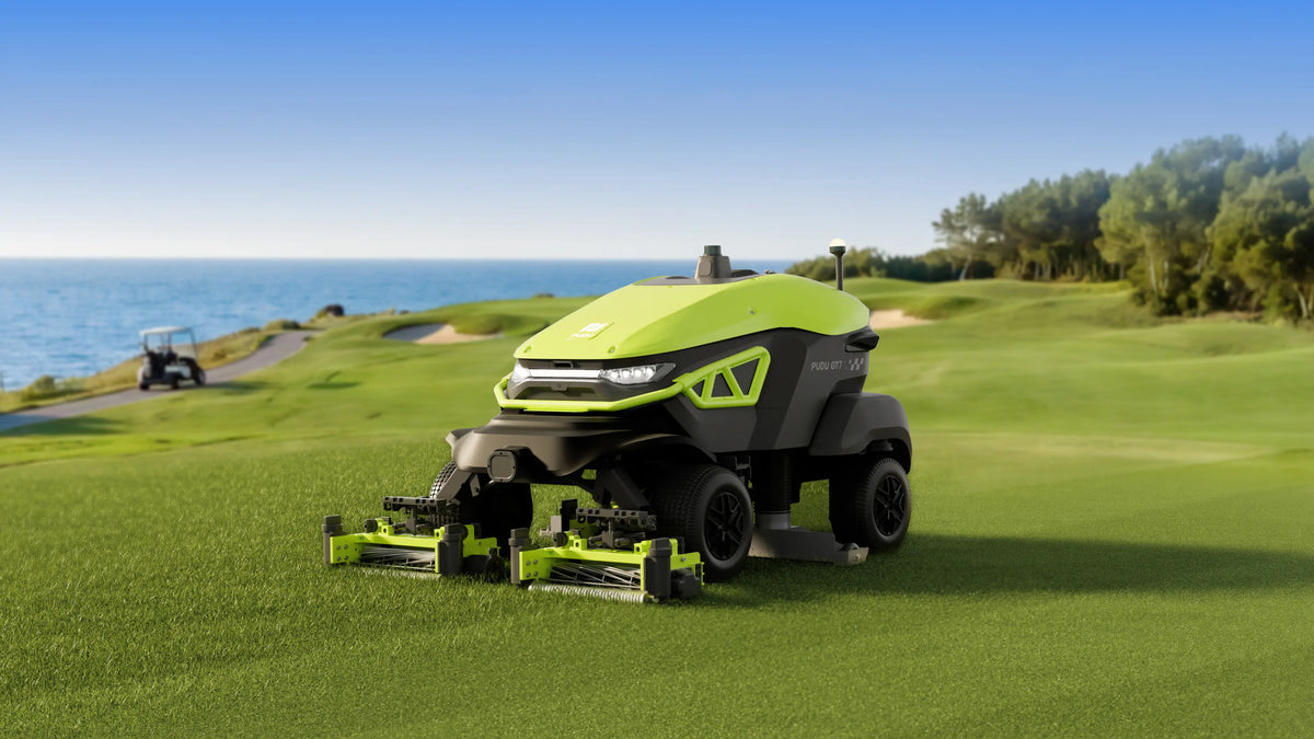 PUDU GT7 robotic mower working on outdoor turf